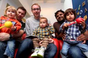 Dad's enjoying taking part with their kids at a baby boogie session in Jubilee library