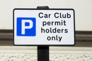 A car club sign showing restrictions