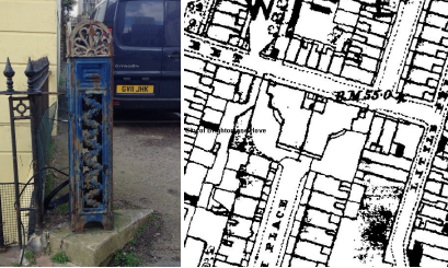 An original pier gate, a blue and rusted cast ironwork pillar. 