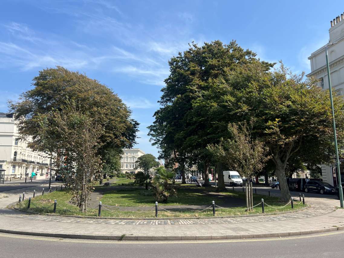 A view of Palmeira Square in Hove, taken from the road at the west end of the square