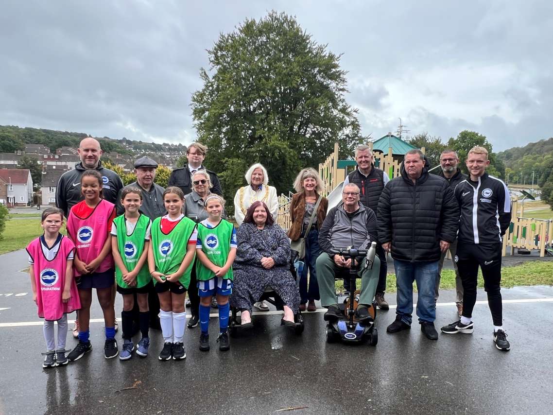 A group of people, including relatives of Nicola Fellows and Karen Hadaway, at the official opening of the new adventure playground