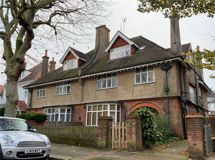 Frontages of the semi-detached houses with 14 on the right.