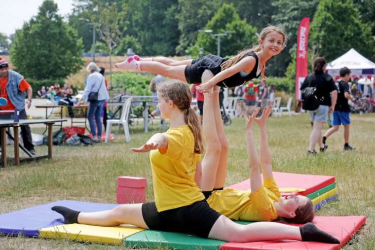 Photograph of children doing gymnastics
