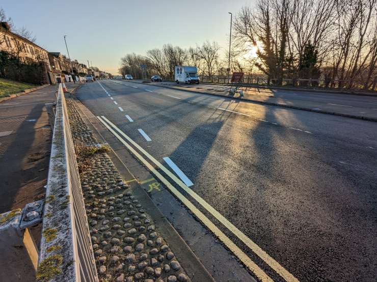 Photograph of a road that has been resurfaced.