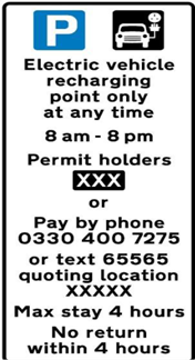 Text on sign reads: Electric vehicle recharging point only at any time. 8am to 8pm. Permit Holders (Permit zone). Or. Pay by phone 0330 400 7275 or text 65565 quoting location (location number) . Max stay 4 hours, no return within 4 hours