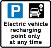 Text on sign reads "Electric vehicle recharging point only at any time"