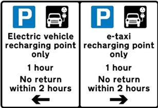 Text on left hand sign reads Electric vehicle recharging point only. 1 hour. No return within 2 hours. Text on right hand sign reads e-taxi recharging point only. 1 hour. No return within 2 hours