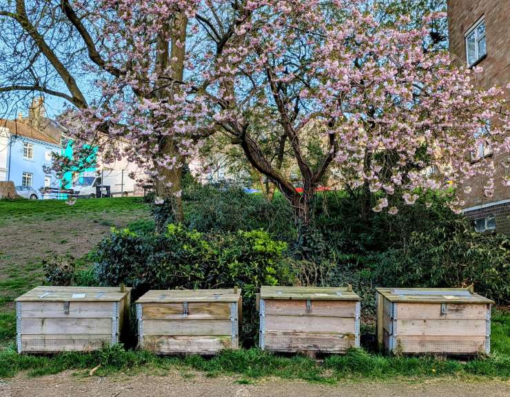 A photograph of 4 compost bins at Albion Hill Corner