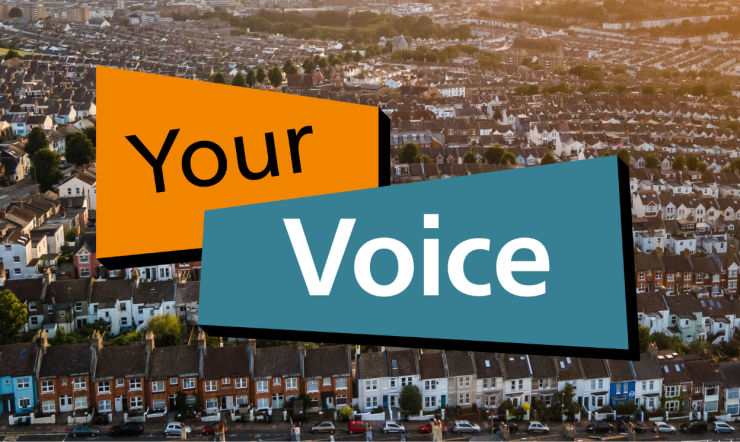 YourVoice logo over a arial photo of residential houses in Brighton and Hove at sunset