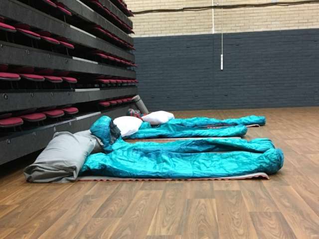 Sleeping bags in a hall