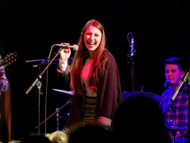 A young person singing