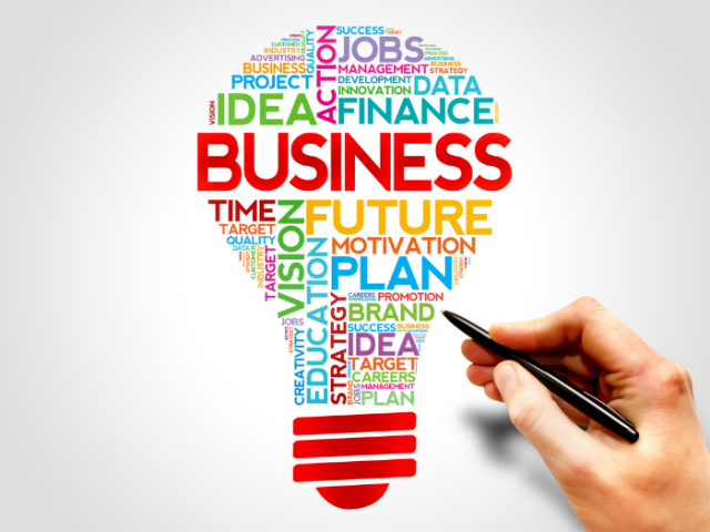 Light-bulb illustration with key words such as 'Business, future, and plan' with hand holding a pen to add new words