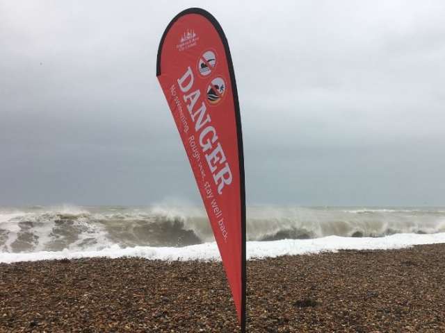 Look out for the red flags and keep away from the sea