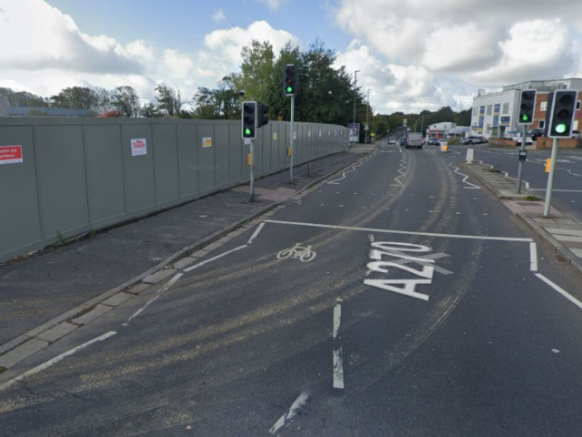 A picture of a two-lane road, with digital text reading 'A270'