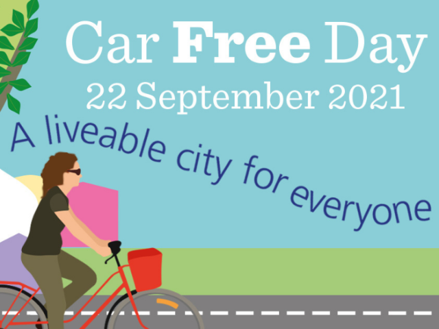 A cartoon style image of a woman cycling with a caption 'car free day 22 September 2021