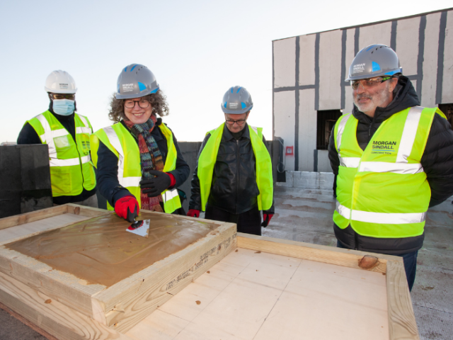 Pictured left to right at the topping out ceremony at the new council homes development in Victoria Road, Portslade are: Taka Musimurimwa, Morgan Sindall Construction; Councillor Siriol Hugh-Jones, co-chair of housing; Councillor David Gibson, co-chair of housing; and Councillor Alan Robins, Mayor of Brighton & Hove and South Portslade ward councillor.