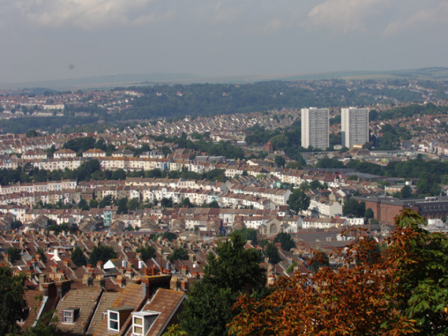 A picture of houses, flats and sky