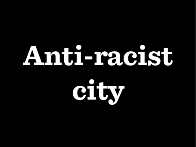 Graphic with text reading 'Anti-racist city'