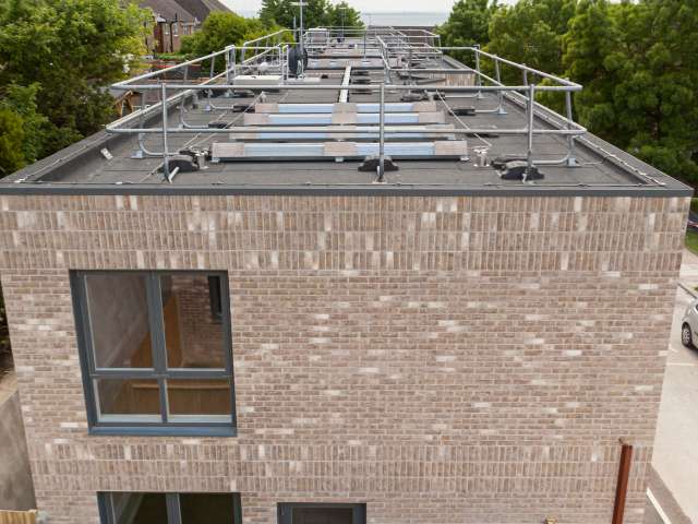 Solar panels on a council housing development at Buckley Close