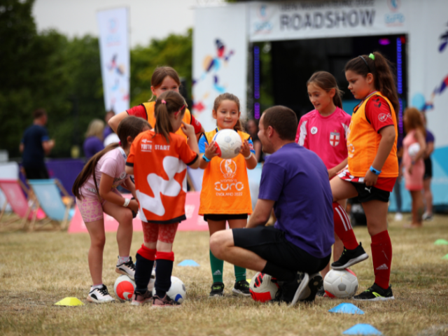 Picture of young football players at a UEFA Women's EURO Roadshow