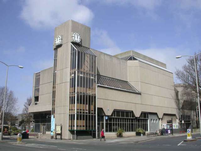 Hove Town Hall viewed from Church Road in Hove, with blue sky and clouds in the background