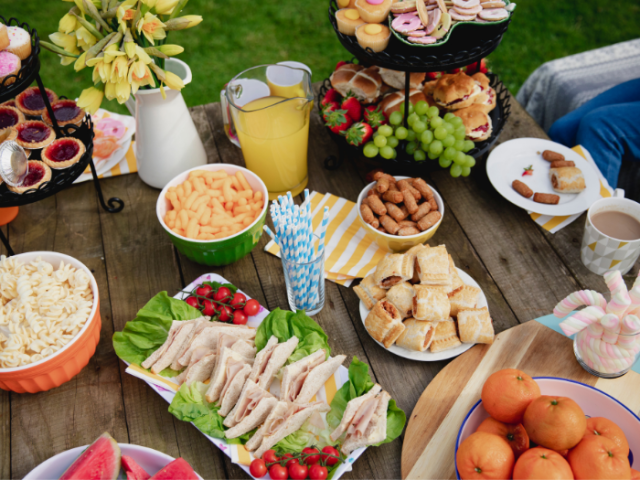 Photo of a table covered with party food