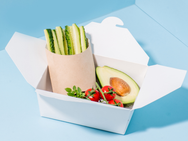 Picture of a cardboard food container and food.