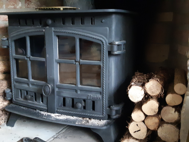 woodburner and logs