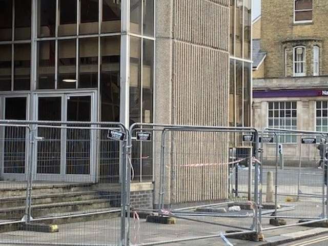 Image of Hove Town Hall tower with fencing around it