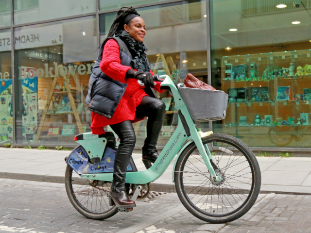 A woman on a bike