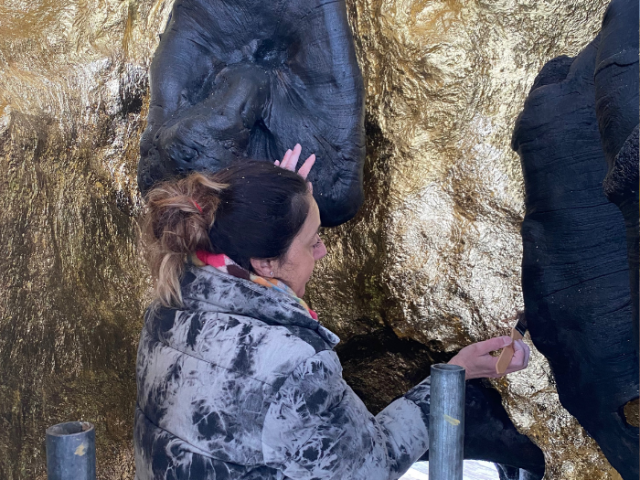 Picture of artist Elpida Hadzi-Vasileva working on the Gild Elm project