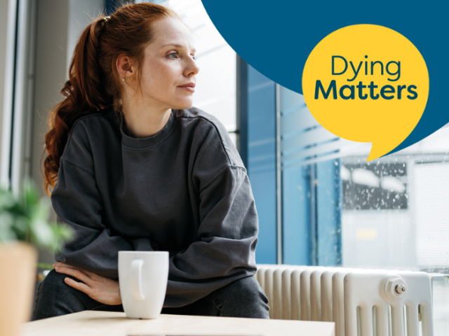 Image showing a red haired woman looking pensively out of the window. The text reads: 'Dying matters.'