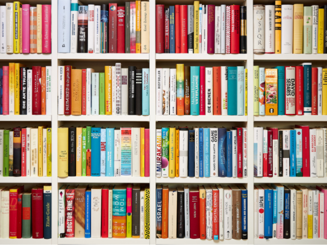 General photograph of books on a packed library bookshelf