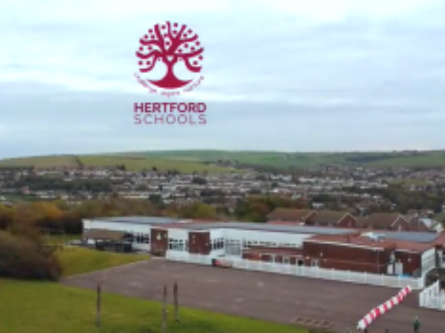 Image shows an aerial view of Hertford Junior school 
