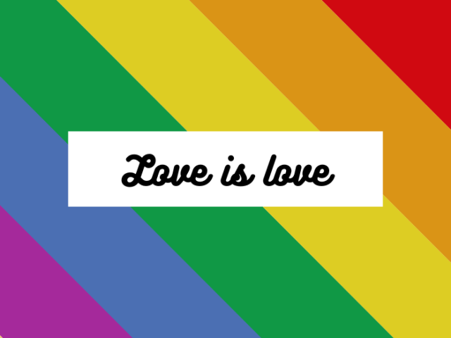 The words, Love is love on a white background against a rainbow flag
