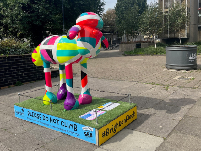 Photo of one of the colourful Shaun by the Sea sculptures outside of Hove Town Hall.