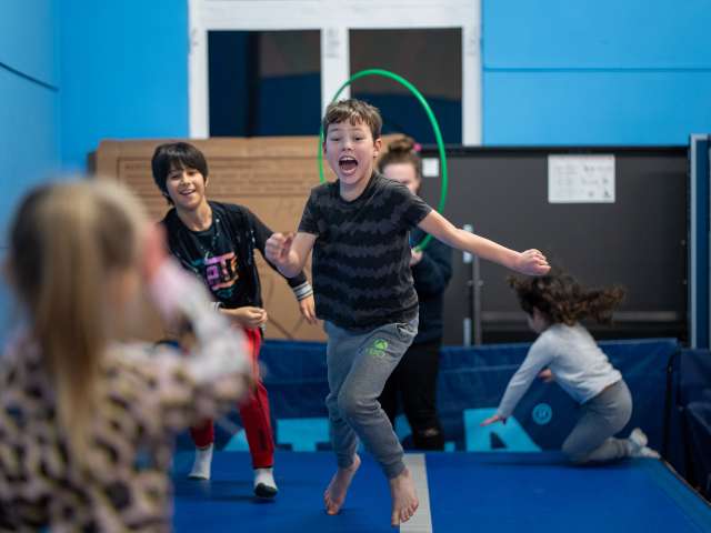 Image of children having fun, taking part in activities.