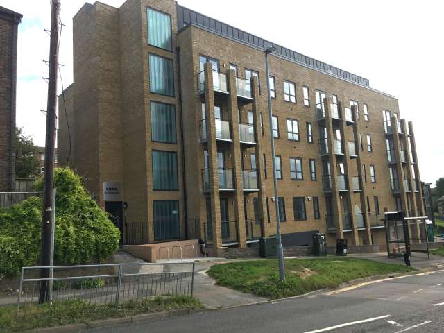 Exterior side view of the Kubic Apartments block of flats
