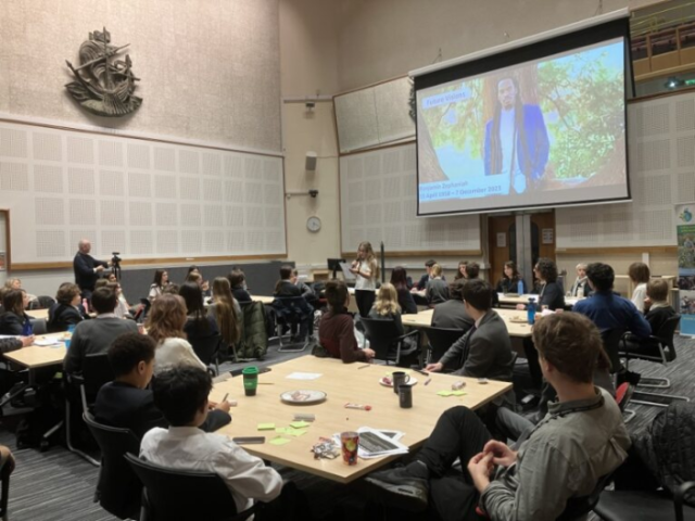 A group of young people at the Secondary Schools for a Sustainable Future Student Summit in the Council Chamber at Hove Town Hall