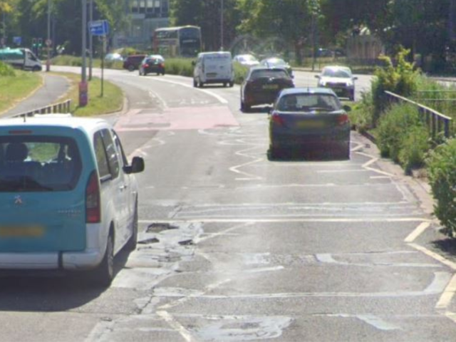 a picture of roads with cars