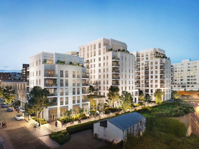 An artist's impression of the proposed new gasworks development shows four multi-story white buildings in a row, the middle two being taller than the outer ones. The buildings are set next to a road on the right where traffic with lights on can be seen. The walkway surrounding the development is also lit up in a dusk scene. 