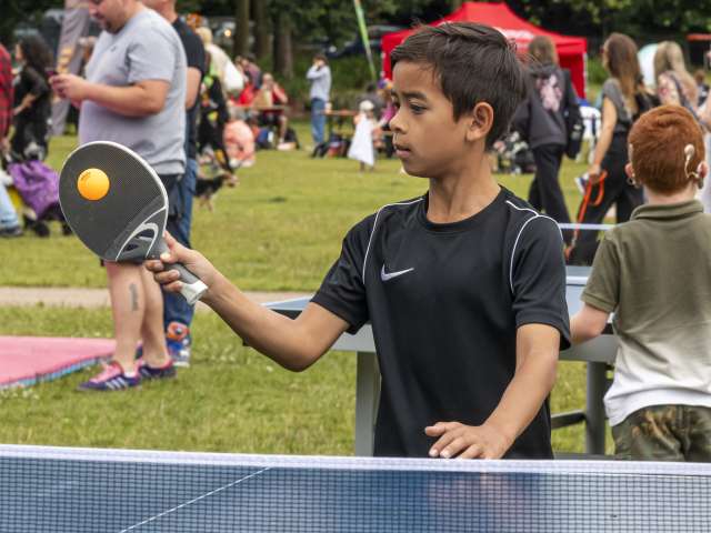 Young boy playing table tennis 