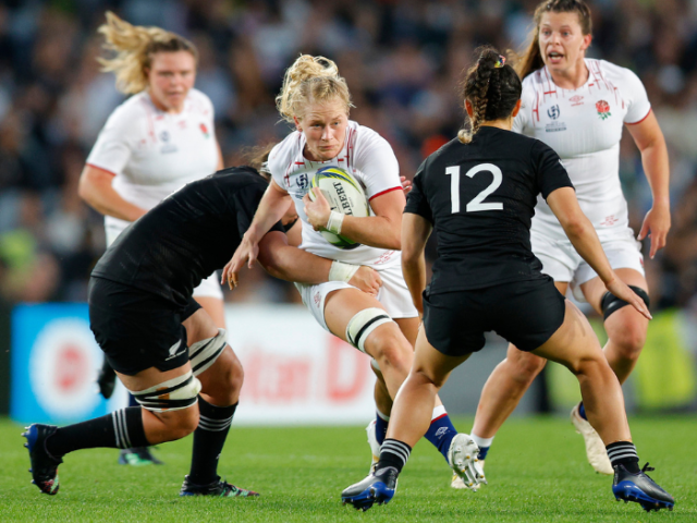 Action picture of the 'Red Roses' - England's women's rugby team