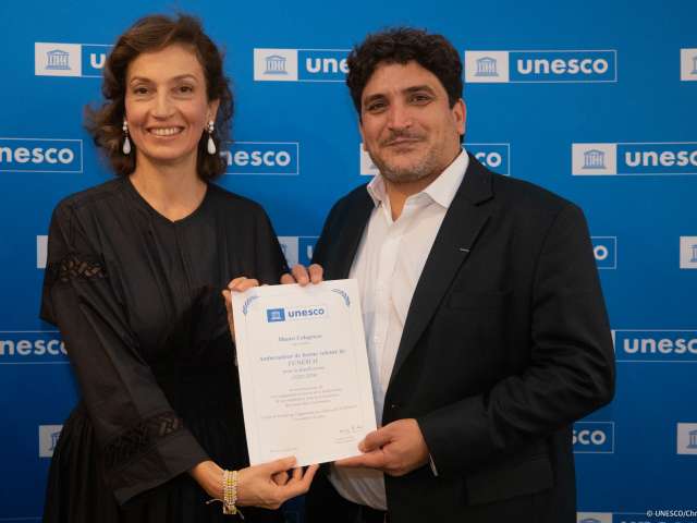Audrey Azoulay, director general of UNESCO presenting chef Mauro Colagreco with his goodwill ambassador certificate