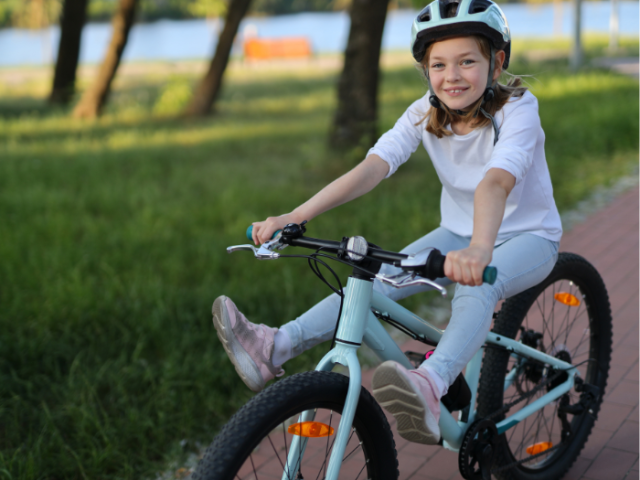 A girl riding a bike