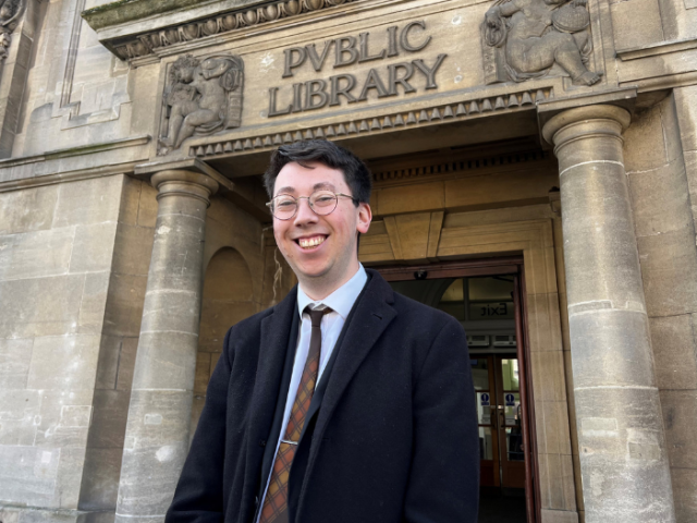 Councillor Jacob Allen outside Hove Library