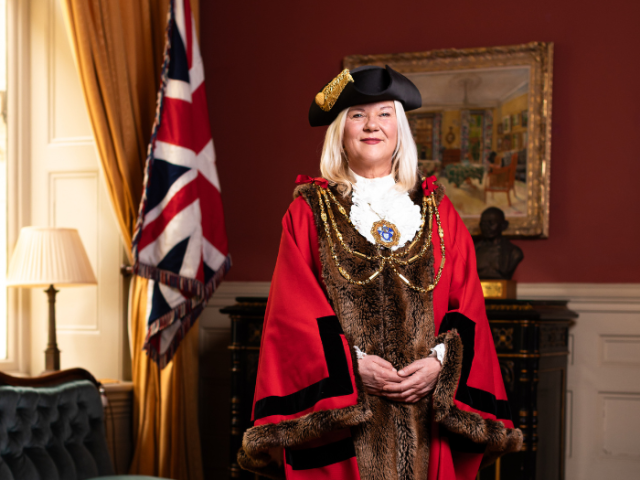 The photo shows Mayor of Brighton & Hove, Councillor Amanda Grimshaw, wearing mayoral robes and insignia.