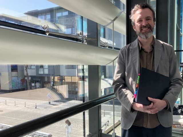 Councillor Tim Rowkins in the sustainable Jubilee Library building