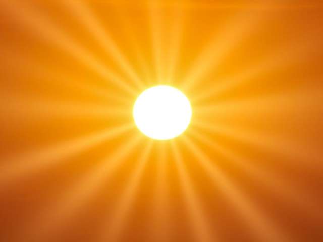 The sun on an orange background 