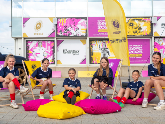 Picture of young rugby players celebrating the Women's Rugby World Cup on Brighton seafront
